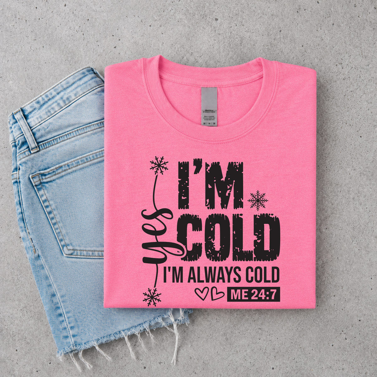 Bright pink T-shirt with Yes I'm Cold graphic for women