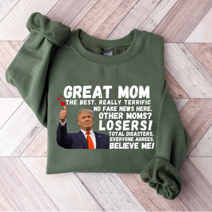 Show your mom she’s the best with this hilarious Great Mom Trump Sweatshirt! Featuring bold text and an iconic thumbs-up image, this design plays on a famous speech style, making it a funny, patriotic, and conservative-friendly gift for Mother’s Day, birthdays, or just because.