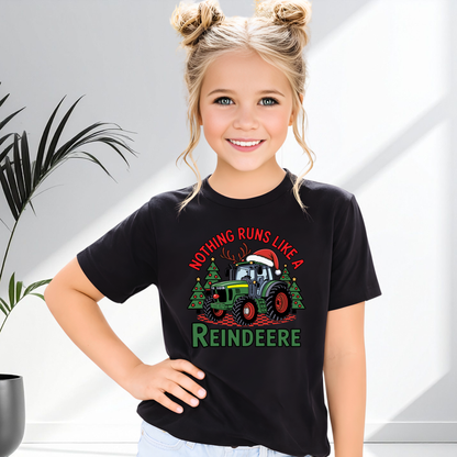 Young girl wearing a black t-shirt with a Farm Christmas-themed design featuring a reindeer and tractor.