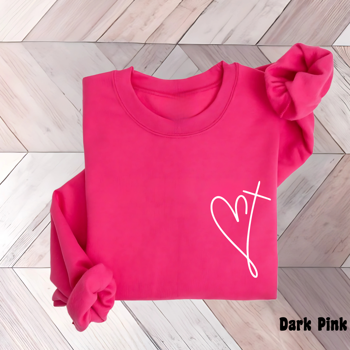Flat lay dark pink heart cross sweatshirt