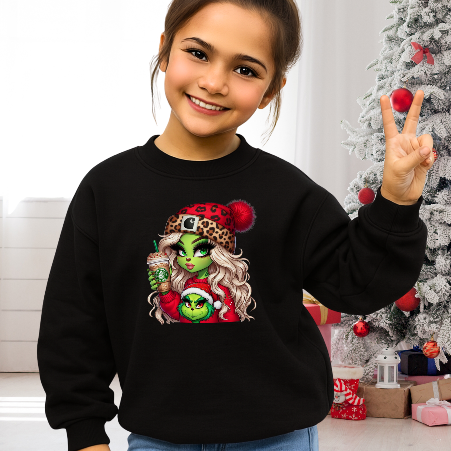 Smiling child in black Christmas sweatshirt – holiday outfit for kids
