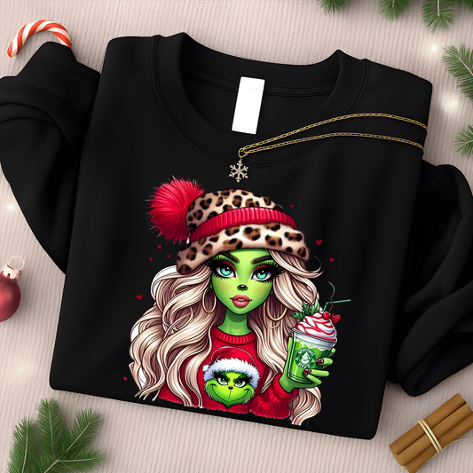 Black sweatshirt with a colorful graphic of a character holding a drink, surrounded by Christmas decorations.