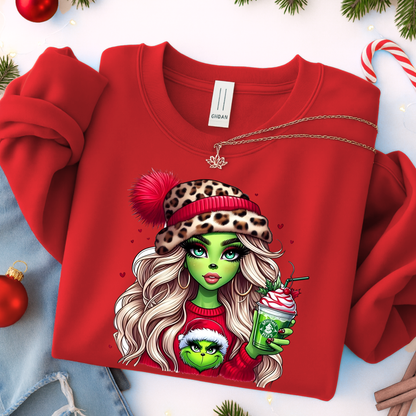 Red sweatshirt with a festive design featuring a character holding a milkshake, surrounded by Christmas decorations.