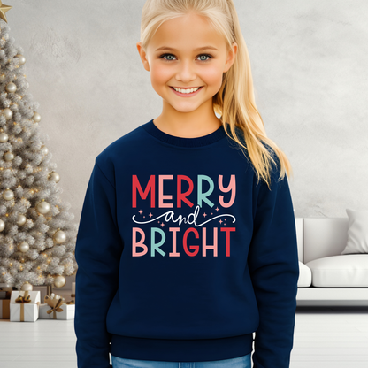 Youth girl wearing navy Merry and Bright Christmas sweatshirt