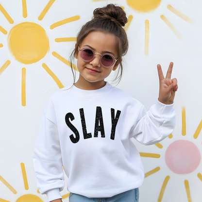 Girl wearing white SLAY sweatshirt with sunglasses and peace sign