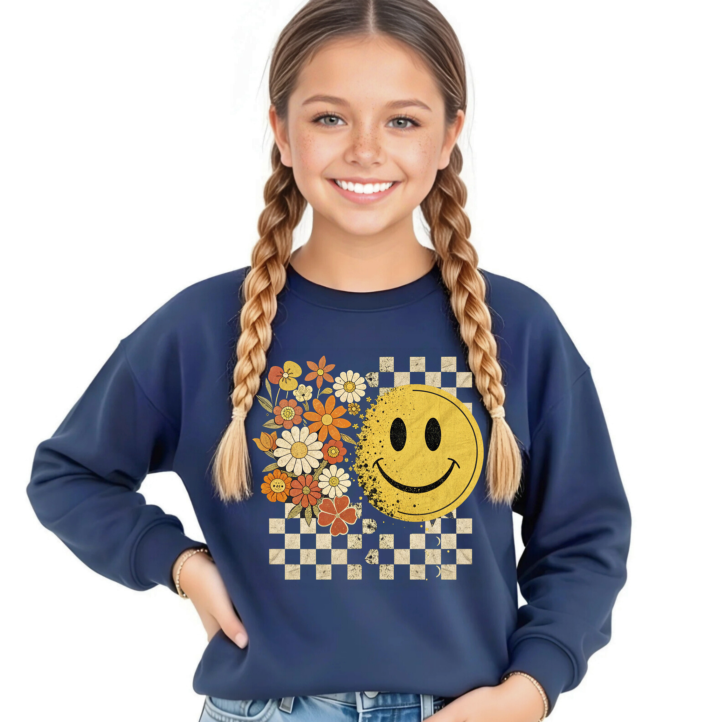 Youth girl wearing a Navy fall smiley face sweatshirt with floral and checkerboard design
