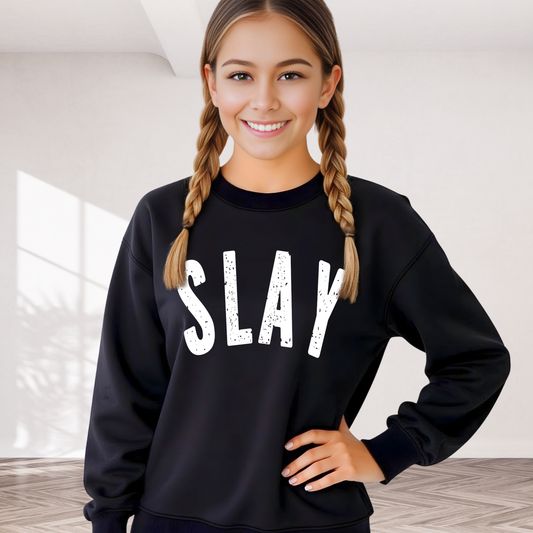 Youth girl wearing black SLAY sweatshirt