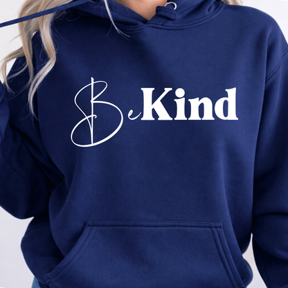 Navy blue hoodie with 'Be Kind' text on a plain background