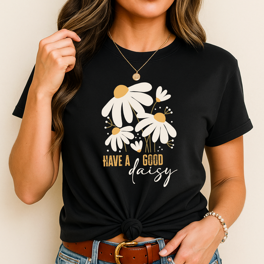 lady wearing a black t-shirt with floral design and text against a neutral background