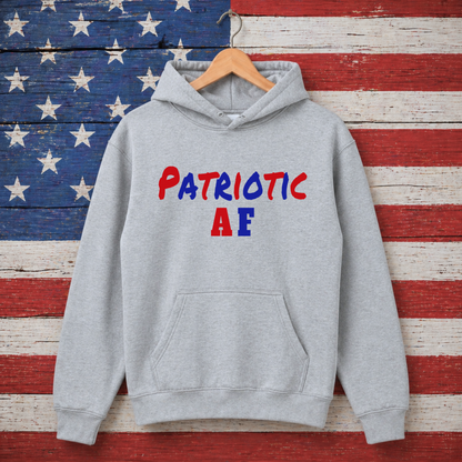 Gray hoodie with 'Patriotic AF' text on a wooden background resembling an American flag.