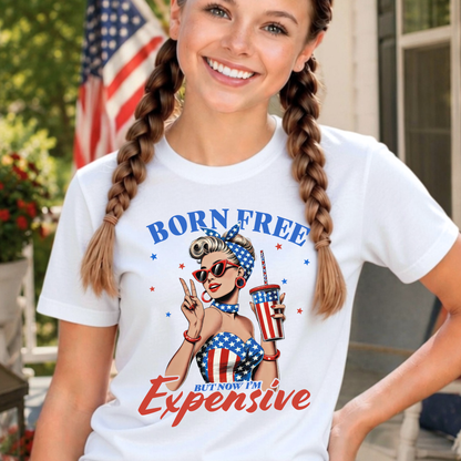 Youth patriotic 4th of July shirt featuring “Born Free But Now I’m Expensive” retro Americana graphic on white tee with braided hairstyle model