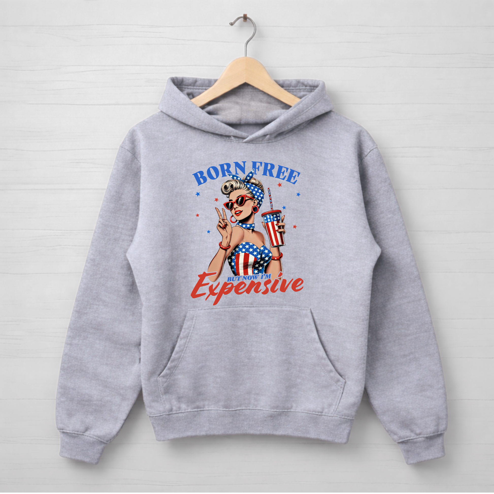 gray hoodie with graphic design "Born Free but now Im expensive .