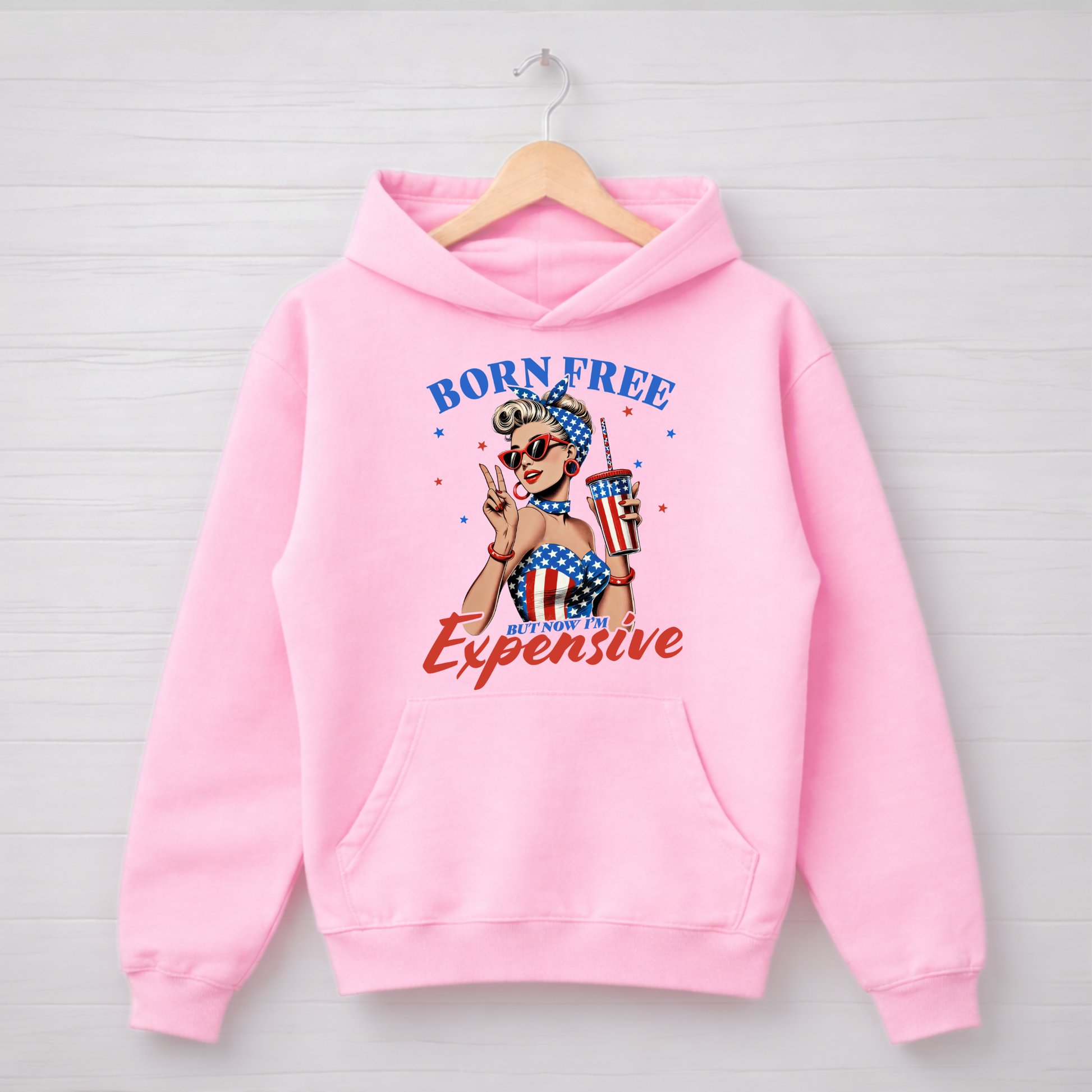 pink hoodie with graphic design "Born Free but now Im expensive .