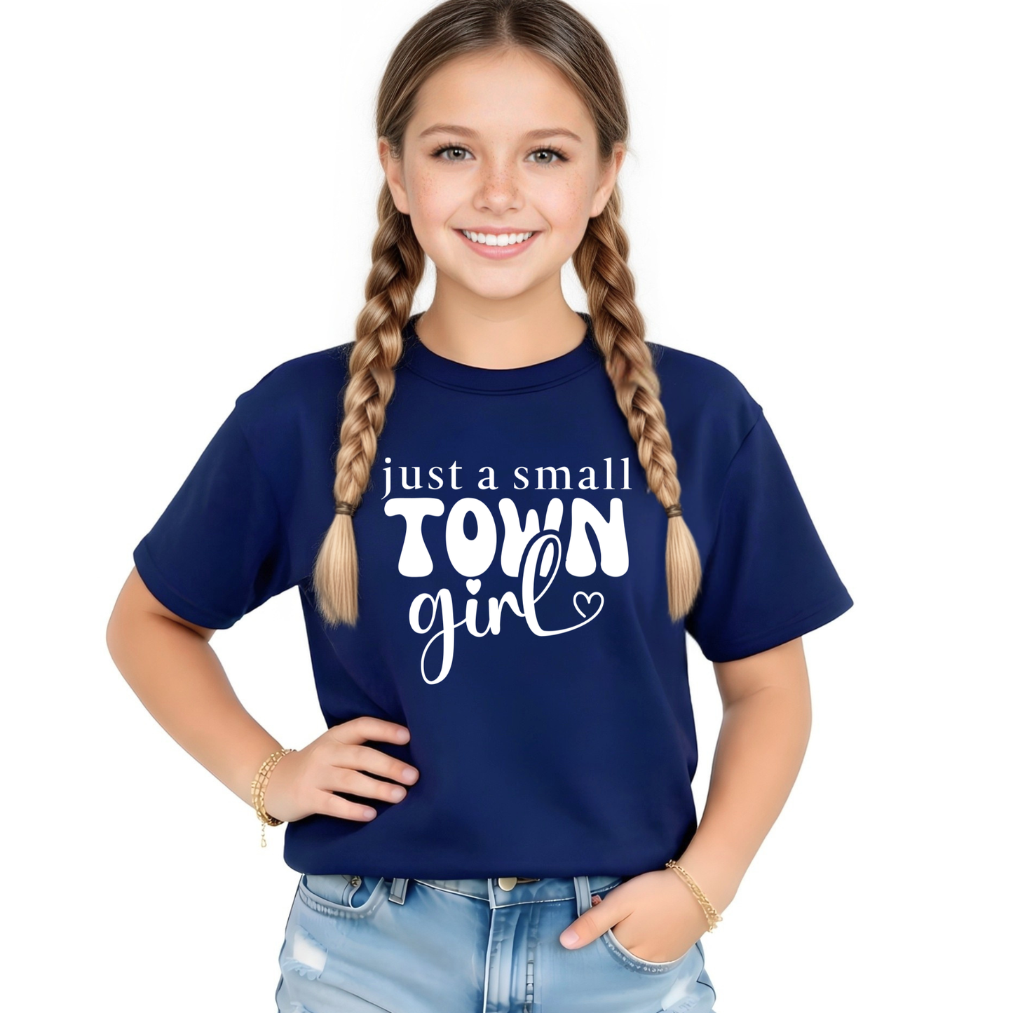Youth girl wearing Navy t-shirt with “just a small town girl” graphic design, cute trendy kids shirt, casual outfit