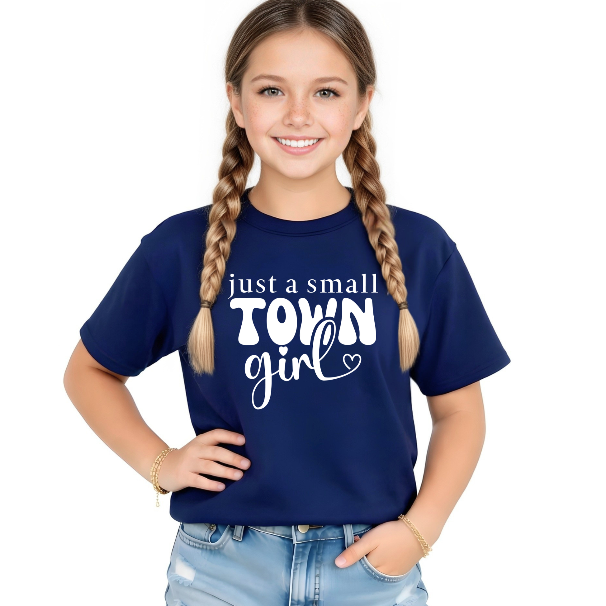 Youth girl wearing Navy t-shirt with “just a small town girl” graphic design, cute trendy kids shirt, casual outfit