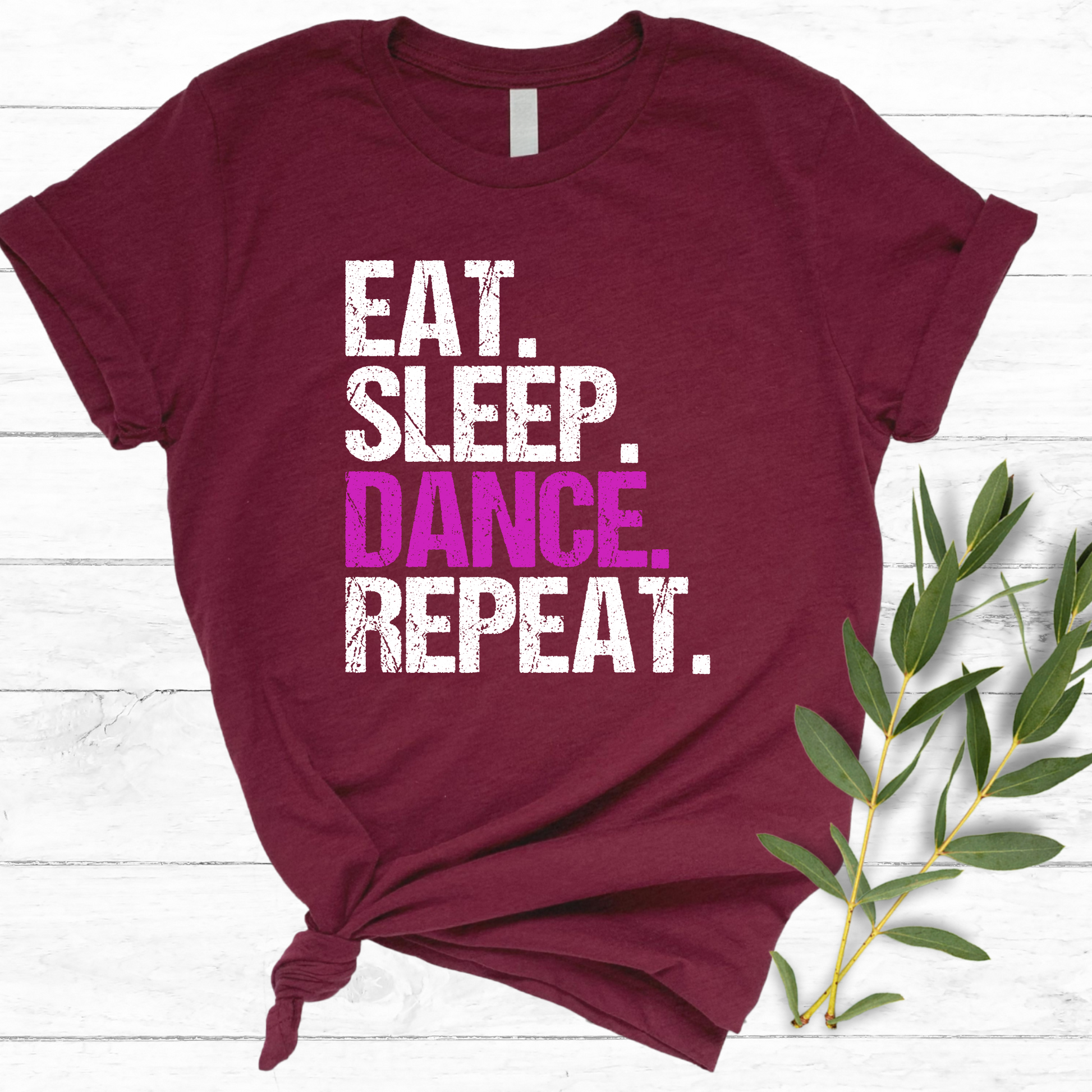 Dance all day in this trendy ‘Eat. Sleep. Dance. Repeat.’ T-shirt! Made for comfort and style, this tee is perfect for hip-hop, ballet, and jazz dancers. A must-have for any dance lover!