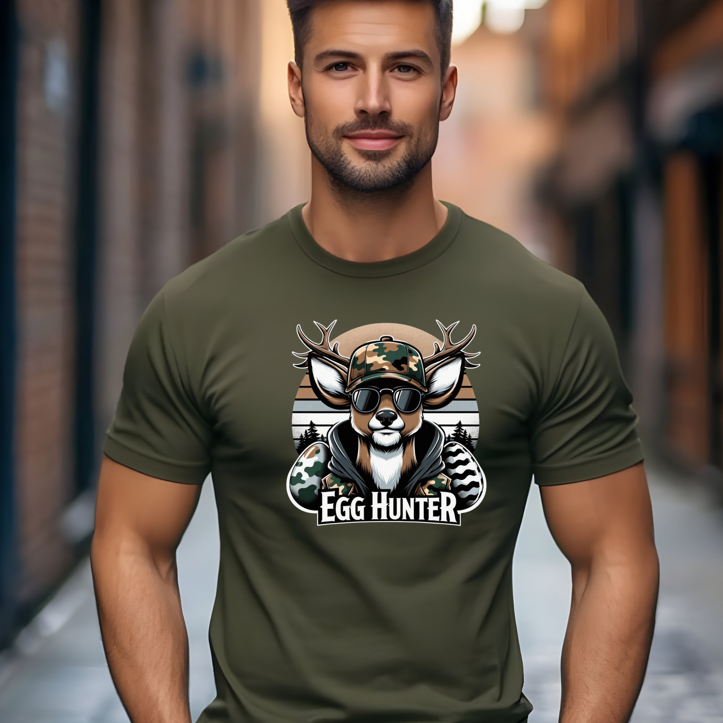 Military-green Egg-Hunter-Shirt featuring a camo deer with sunglasses and Easter eggs, perfect for hunters, veterans, and outdoor enthusiasts.