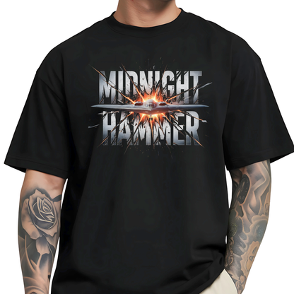 Oversized Midnight Hammer stealth bomber graphic tee on male model – black shirt with silver text and fire burst