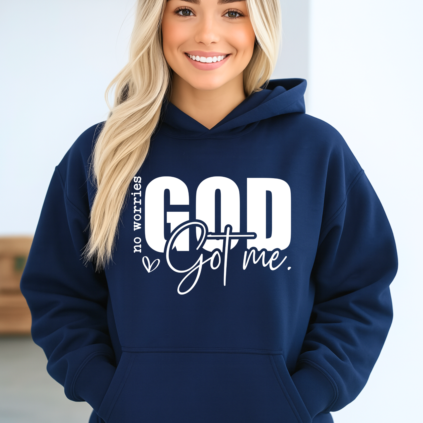 Woamn wearing a "No worries, GOD got me" Hoodie