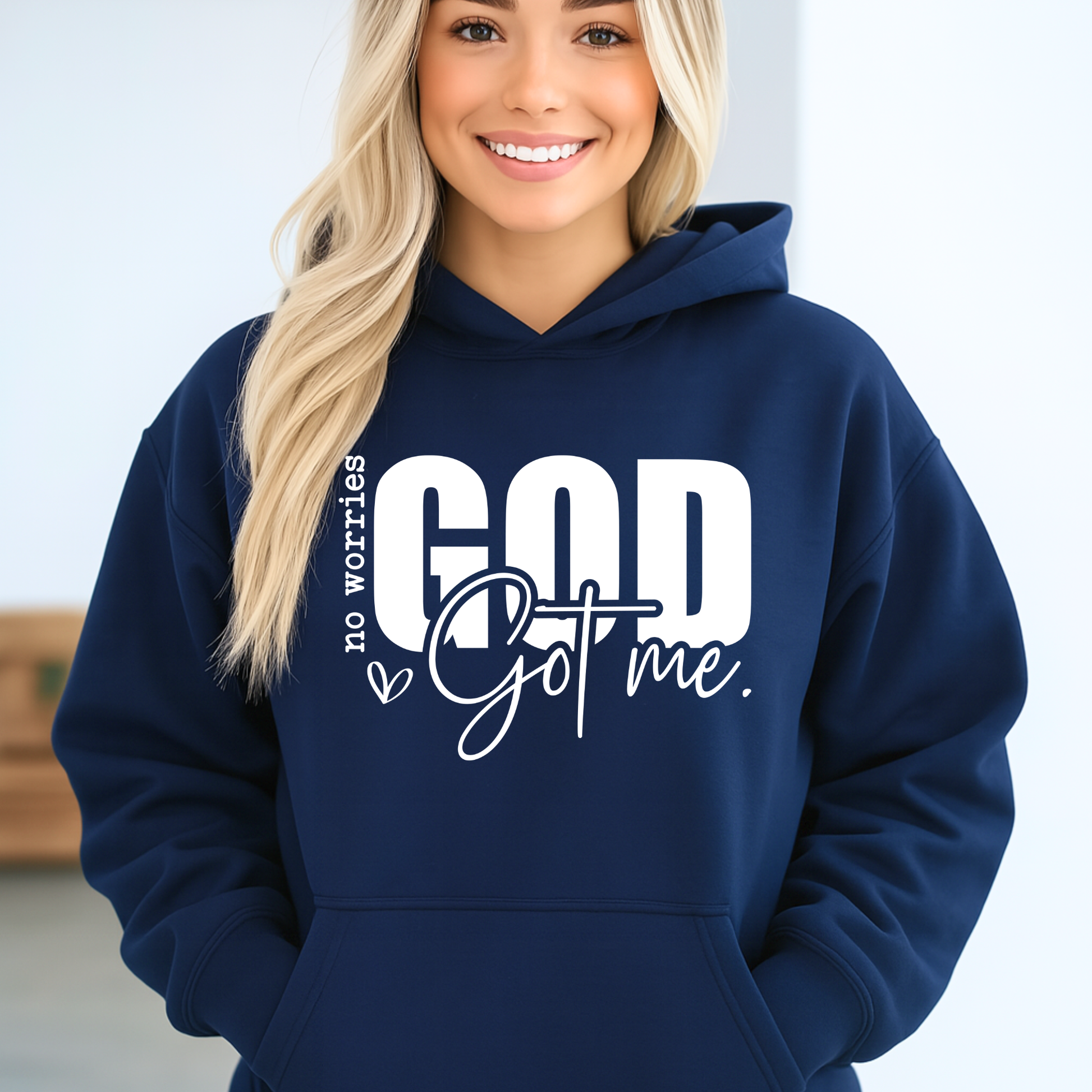 Woamn wearing a "No worries, GOD got me" Hoodie