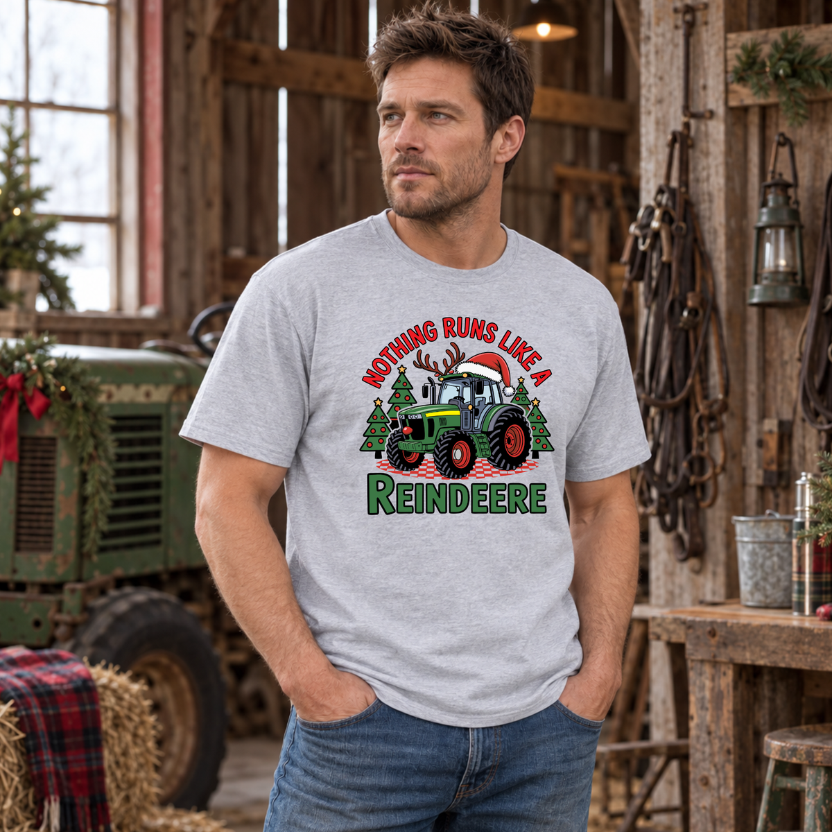 Man wearing a sports gray Nothing Runs Like a Reindeere sweatshirt in a wooden barn.