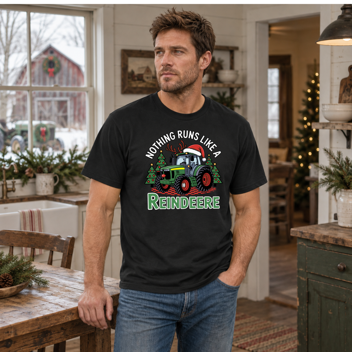 Man wearing a black Nothing Runs Like a Reindeere T-shirt in a Christmas farmhouse kitchen.