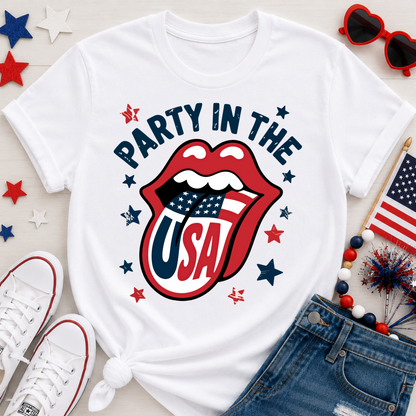 Cute patriotic 4th of July shirt flatlay with denim shorts and American flag accessories