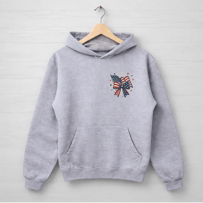 Gray hoodie with a colorful butterfly design on a wooden hanger against a light gray background