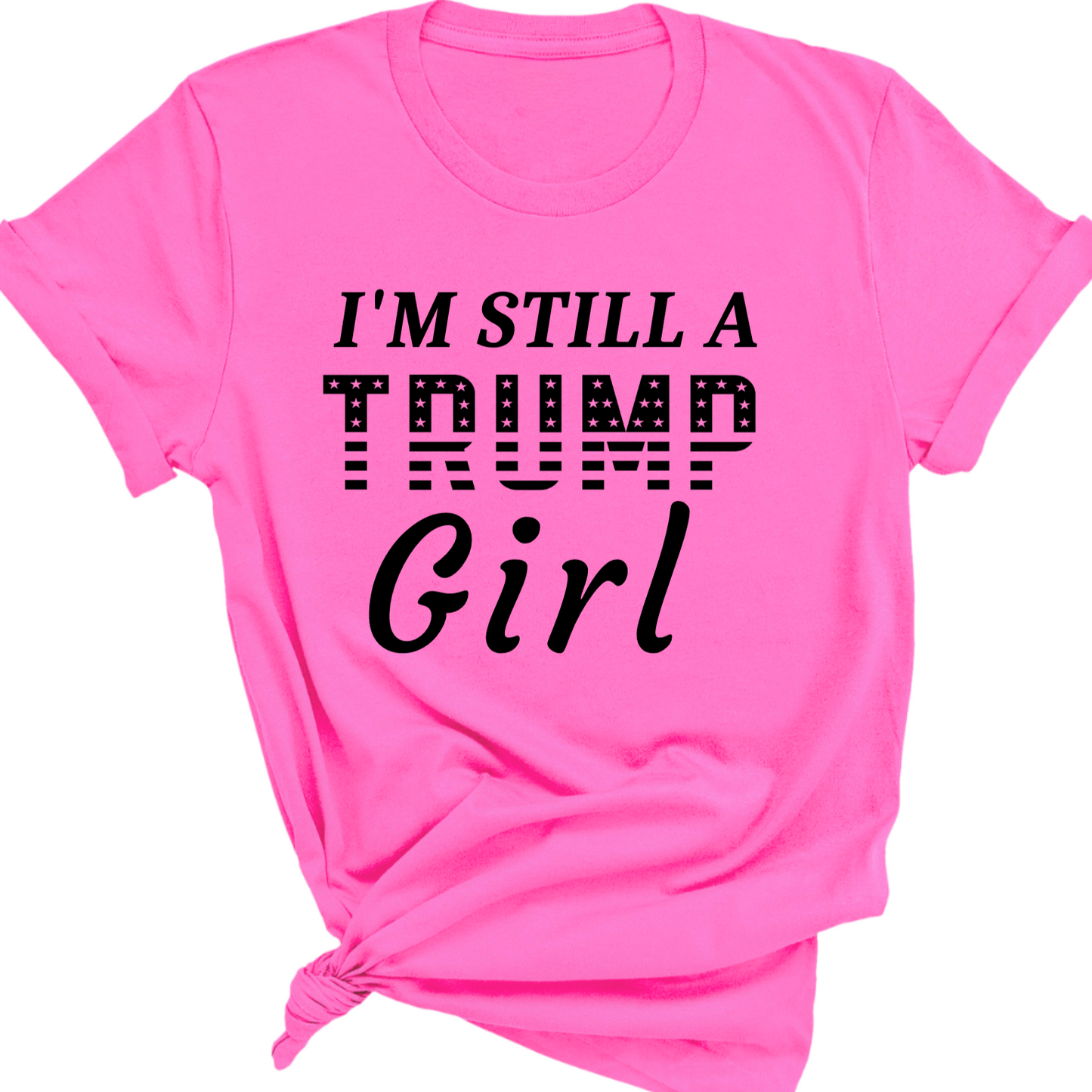 pink T-shirt with bold black “I’m Still a Trump Girl” patriotic text design