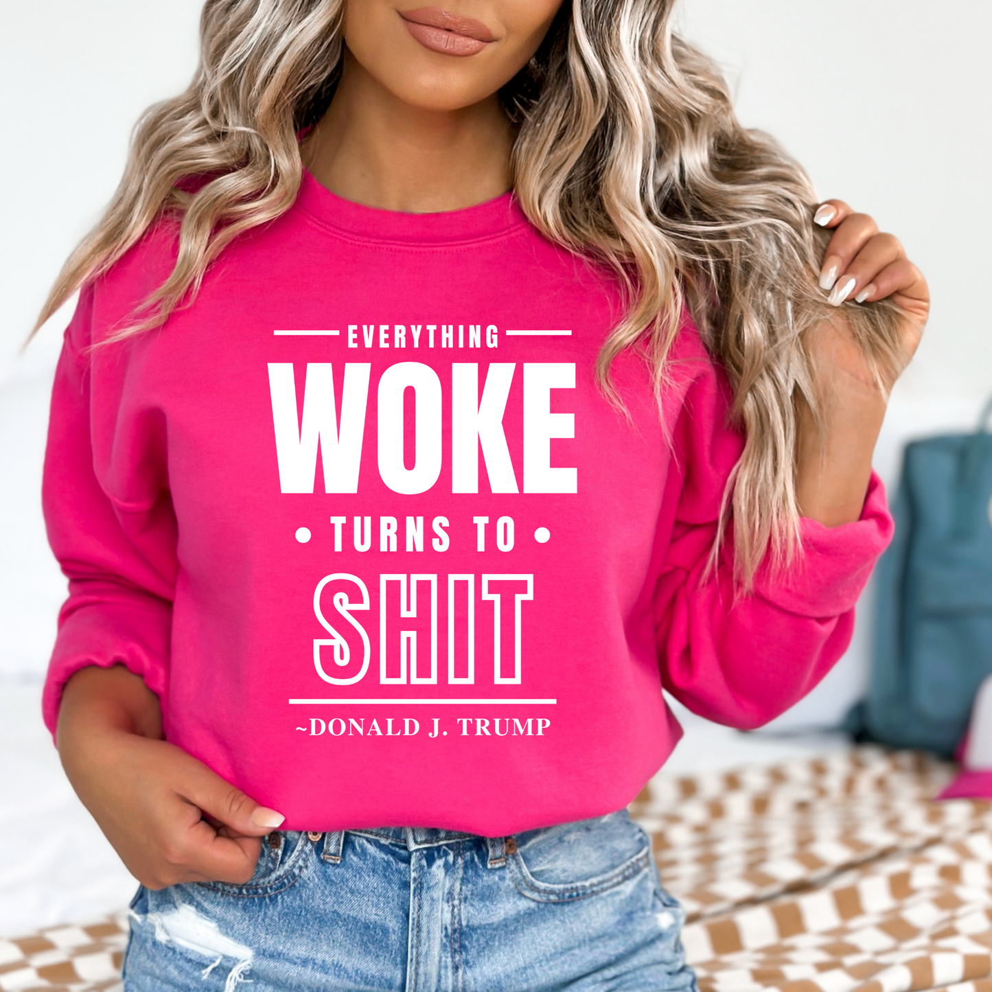 pink sweatshirt with white quote