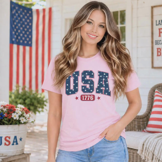 Woman modeling womens USA 1776 pink Tshirt