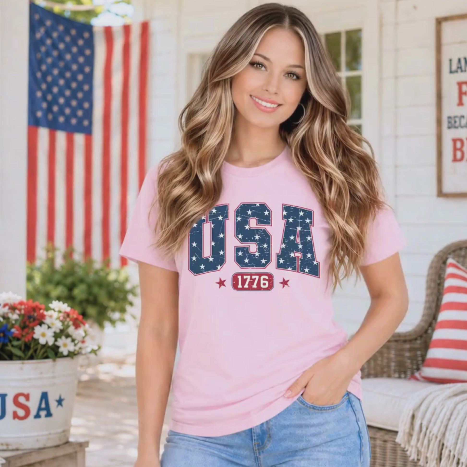 Woman modeling womens USA 1776 pink Tshirt