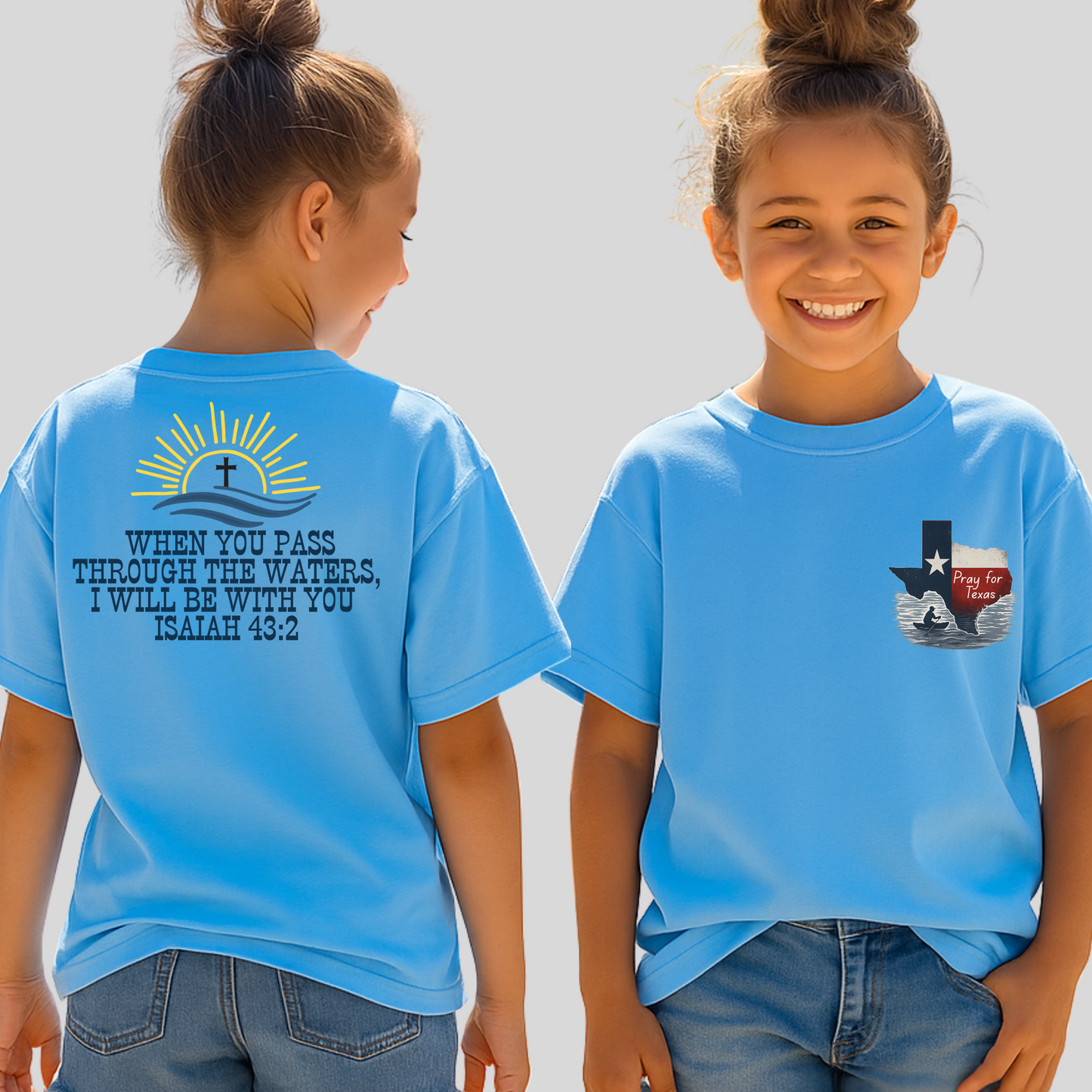 Youth girl wearing light blue Christian t-shirt with “Pray for Texas” Texas state graphic on front and Isaiah 43:2 Bible verse on back with sunrise and cross symbol, flood relief faith-based kids shirt