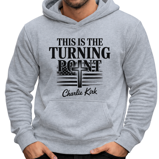 Man wearing athletic gray hoodie featuring “This Is the Turning Point” cross and flag design with front pocket