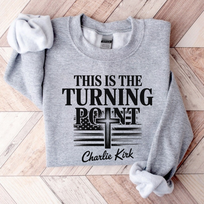 Flat lay athletic gray sweatshirt with Turning Point cross and distressed flag design
