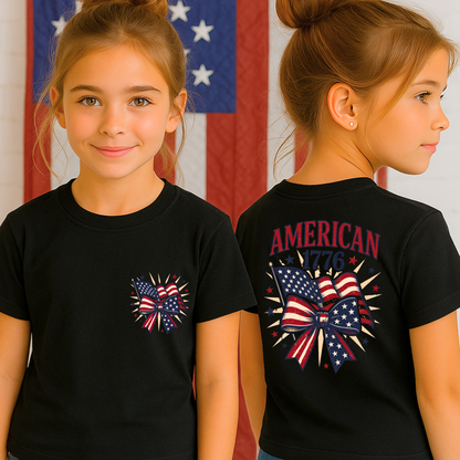 Black tee on teen girl with front pocket-style bow flag print.