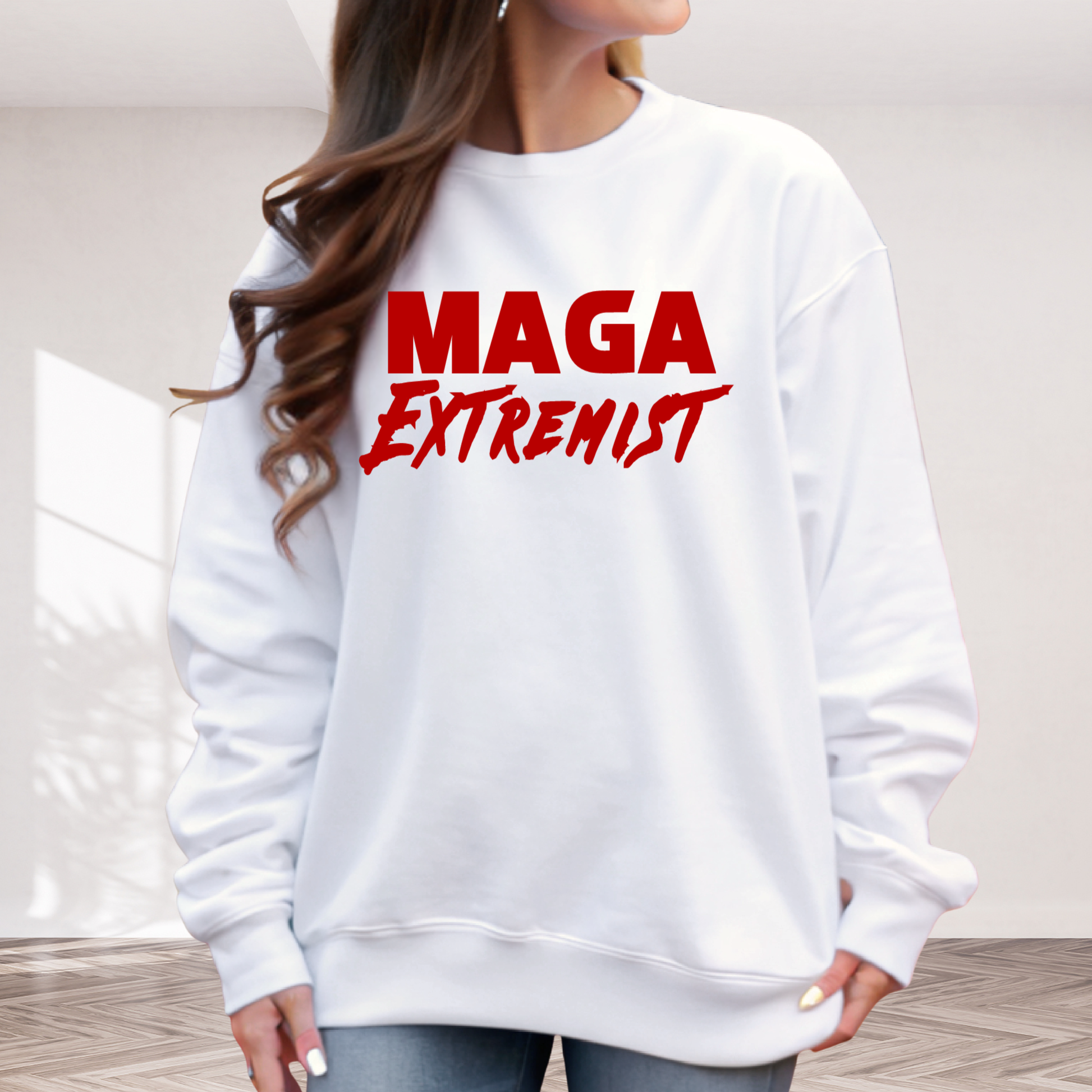 Woman wearing white crewneck sweatshirt with red MAGA Extremist design, conservative political apparel