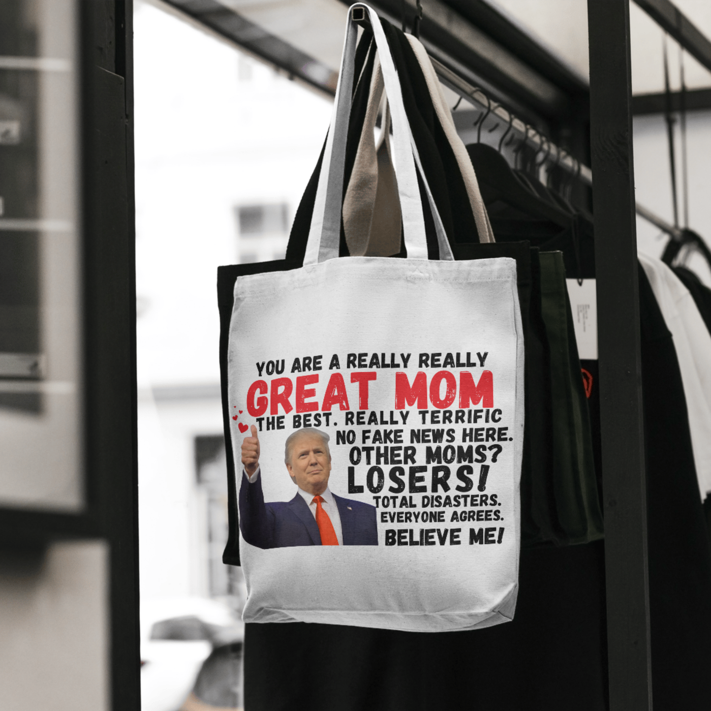 Tote bag with Trump quote hanging on chair – patriotic gift for her