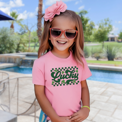 Pink festive St. Patrick’s Day T-shirt featuring shamrocks and a lucky Irish-themed design